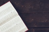 The Holy Bible on a wooden table